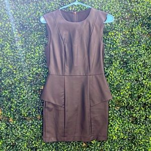 BCBG black leather mini with cutouts on back